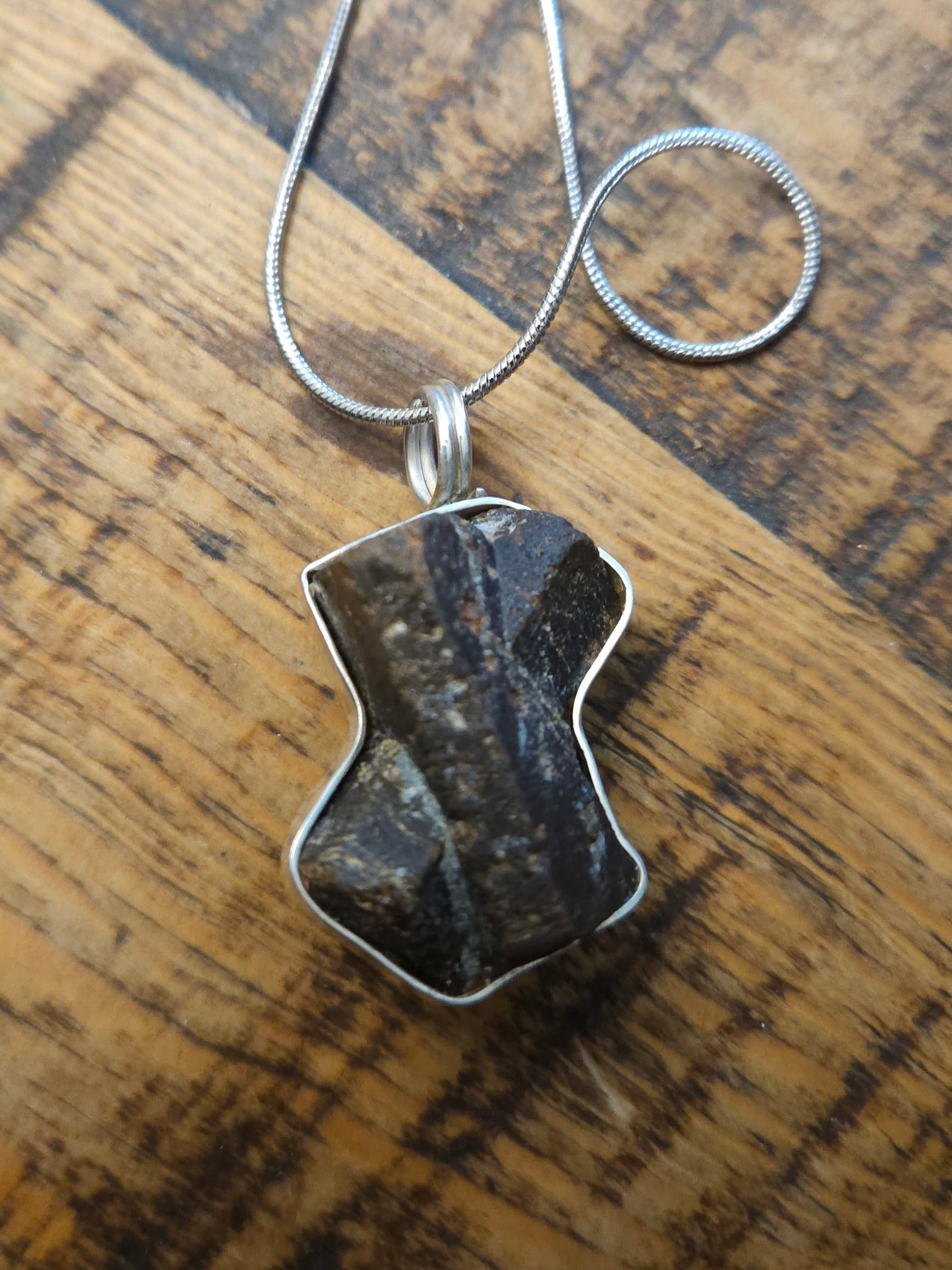 Handmade Sterling Silver wrapped Staurolite